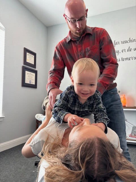Home 2 Chiropractic adjustment session with a child at Antignolo Chiropractic.