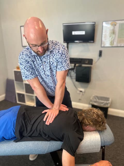 Scoliosis 1 Stress relief chiropractic adjustment at Antignolo Chiropractic clinic.